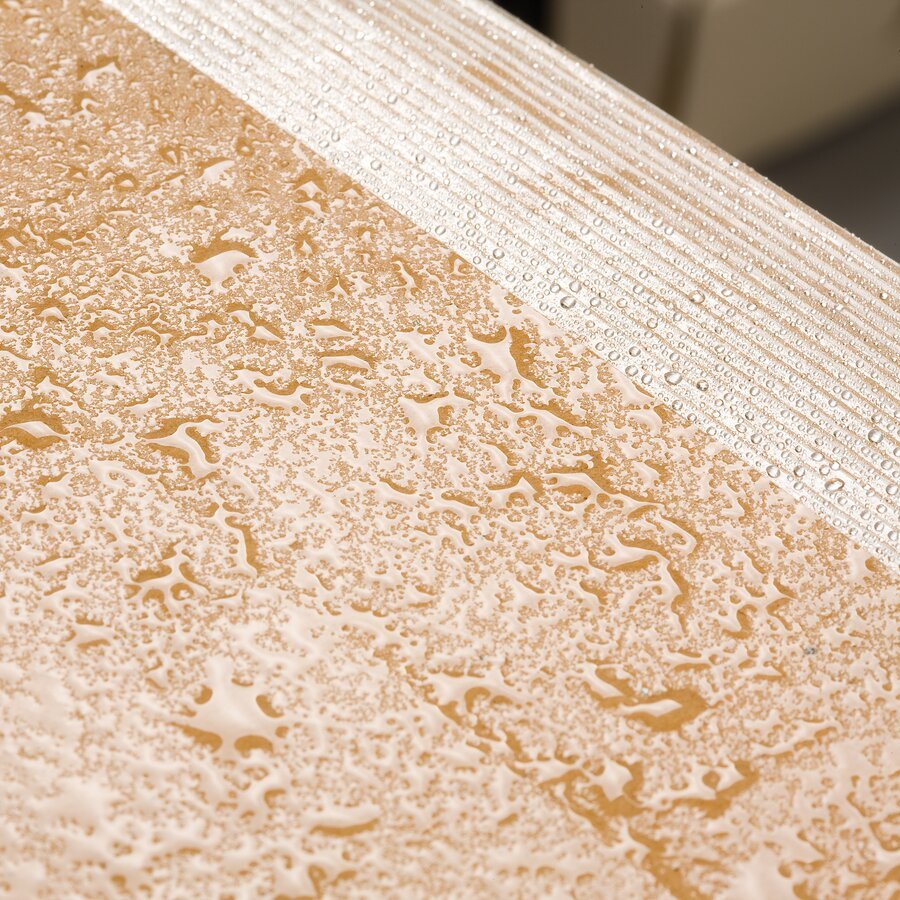 Das PE-beschichtete Packpapier ist 100% wasserabweisend Das PE-beschichtete Packpapier ist 100% wasserabweisend