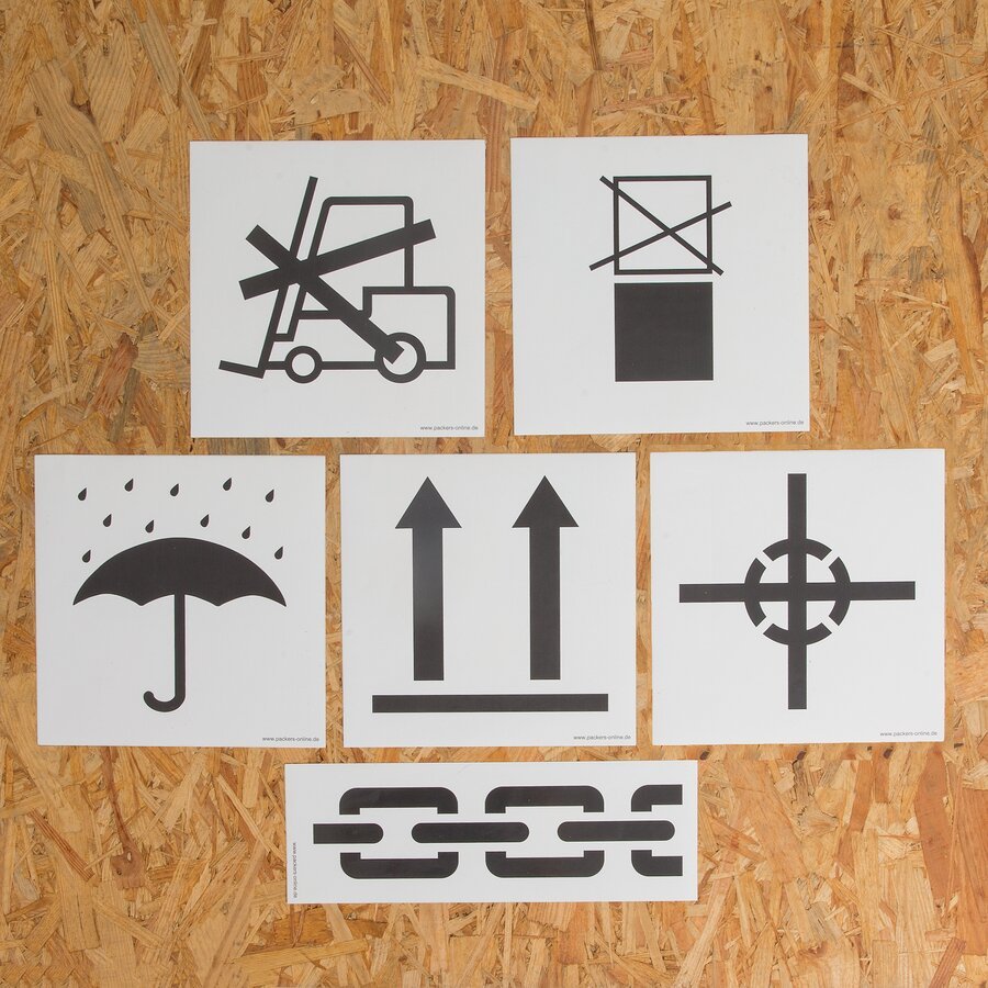 Vielfältige Etiketten für unterschiedlichste Anwendungen 6 Hinweisetiketten aufgeklebt auf einer Holzkiste